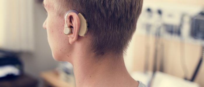 young man with hearing aid